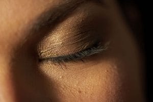 Woman with eyes closed as if she was sleeping