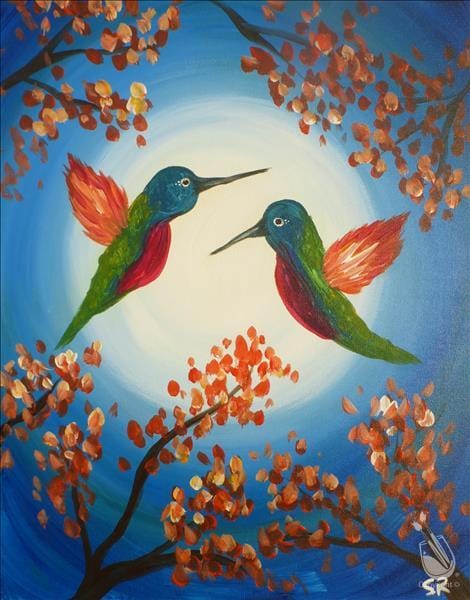 Two hummingbirds on blue sky background