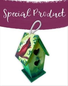 wooden birdhouse with cardinal