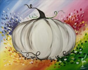 White pumpkin on abstract rainbow background